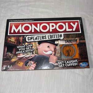 Hasbro Monopoly Cheaters Edition with Red and Black Design